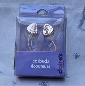 Claire's heart-shaped earbuds in a rose-gold tone finish.